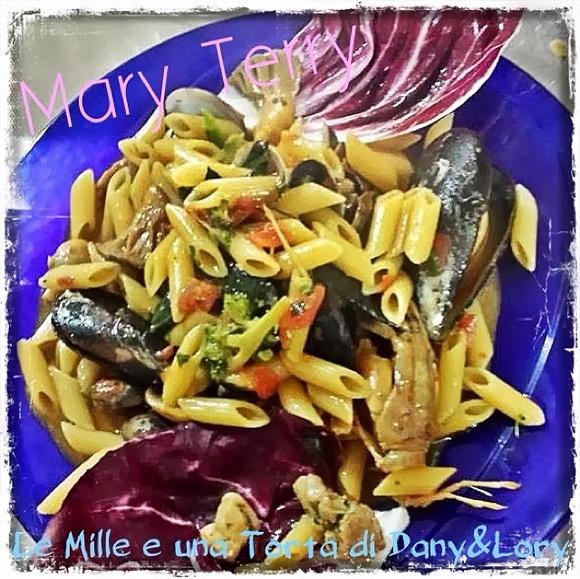 Mezze penne ai frutti di mare con porcini e verdure