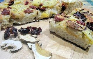 Pizza con pomodorini ciliegino secchi e funghi porcini