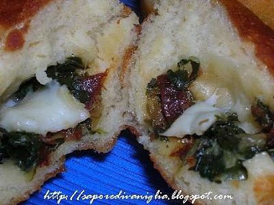 Krapfen con sorpresa ripieni di spinaci e formaggio