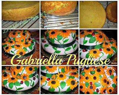 Torta a due piani con girasoli in pasta di zucchero e crema Chantilly alle fragole