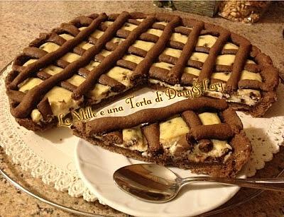 Crostata al cacao ripiena di ricotta e gocce di cioccolato