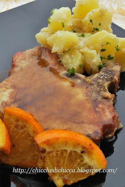 Bistecchine di maiale all'arancia con patate alla crema