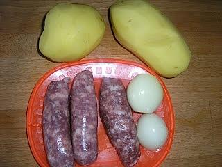 Patate con salsiccia al forno