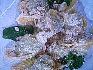 Tortelli di ricotta con spinaci ortiche e frutta secca