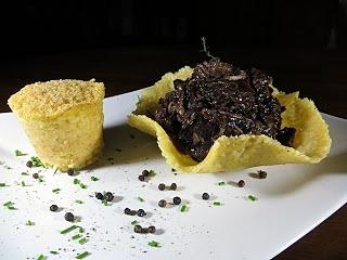 Stracotto di arista di maiale al vino novello con parmigiano e patate