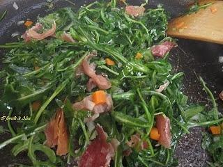 Spaghetti con rucola e speck