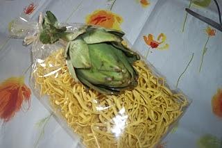 Tagliolini al limone con carciofi e funghi
