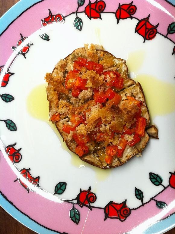 Melanzane al forno con pomodori a cubetti