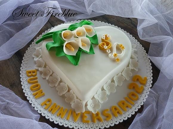 Torta a forma di cuore con calle per anniversario di Sara e Daniele
