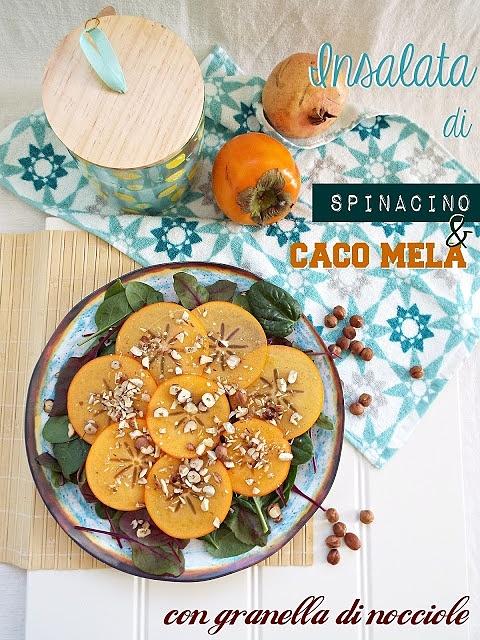 Insalata di spinacino e caco mela con granella di nocciole