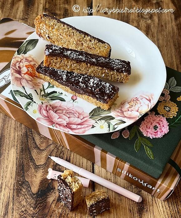 Barrette di avena al miele ricoperte di cioccolato
