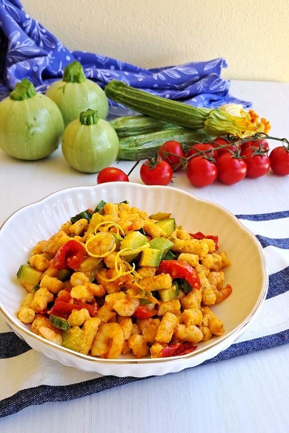 Passatelli asciutti con gamberetti, zucchine e pomodorini